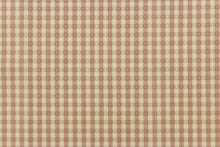 Load image into Gallery viewer, This yarn dye stripe fabric features a small plaid or checkered design in khaki and blush. 
