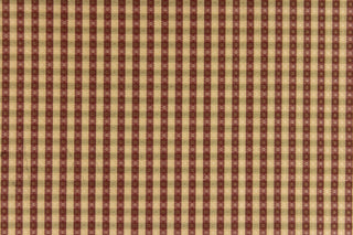 This yarn dye stripe fabric features a small plaid or checkered design in tan, burgundy and taupe.
