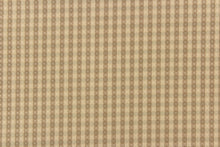 Load image into Gallery viewer, This yarn dye stripe fabric features a small plaid or checkered design in khaki, taupe and tan . 
