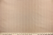 Load image into Gallery viewer, This stunning yarn dyed fabric features a small plaid design in beige, khaki and pale mauve.
