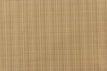 Load image into Gallery viewer,  This stunning yarn dyed fabric features a small plaid design in beige tones and tan. 
