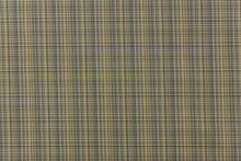 Load image into Gallery viewer,  This stunning yarn dyed fabric features a small plaid design in blue, black, and golden tan or beige.
