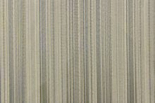 Load image into Gallery viewer, This jacquard fabric features variegated stripes in slate and cream is perfect for accent pillows, throws, blankets, window treatments (draperies and valances), and upholstery projects. We offer this fabric in other colors.
