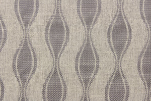 This jacquard fabric features a geometric design in silver and is perfect for accent pillows, throws, blankets, window treatments (draperies and valances), and upholstery projects. We offer this fabric in other colors.
