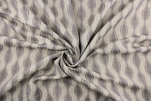 This jacquard fabric features a geometric design in silver and is perfect for accent pillows, throws, blankets, window treatments (draperies and valances), and upholstery projects. We offer this fabric in other colors.