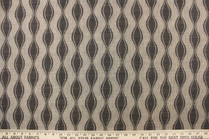 This jacquard fabric features a geometric design in onyx and brown and is perfect for accent pillows, throws, blankets, window treatments (draperies and valances), and upholstery projects.