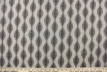 Load image into Gallery viewer, This jacquard fabric features a geometric design in graphite gray and is perfect for accent pillows, throws, blankets, window treatments (draperies and valances), and upholstery projects.
