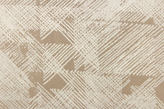 This jacquard abstract design features the colors of sand and cream is great for home decor such as multi purpose upholstery, window treatments, pillows, duvet covers, tote bags and more.  The fabric has a subtle sheen.  It has a soft workable feel yet is stable and durable with a rating of 15,000 double rubs. 