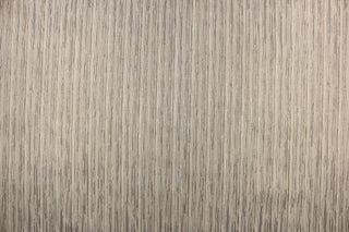 This fabric features a striae design in varying shades of brown and beige.  It would be great for home decor such as multi-purpose upholstery, window treatments, pillows, duvet covers, tote bags and more.  It has a soft workable feel yet is stable and durable.