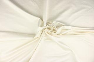 This mock linen in shimmering ivory would be perfect for blouses, shirts, dresses and light jackets, pillows and drapery.