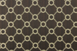  This jacquard fabric features a geometric design in beige on a brown/black background and is great for home decor such as multi-purpose upholstery, window treatments, pillows, duvet covers, tote bags and more.  It has a soft workable feel yet is stable and durable.