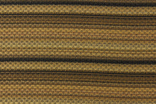 Load image into Gallery viewer,   This jacquard fabric features a heavily striped pattern in shades of black, brown and gold. 
