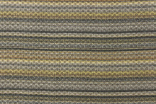 Load image into Gallery viewer, This jacquard fabric features a heavily striped pattern in shades of blue, yellow and gray. 
