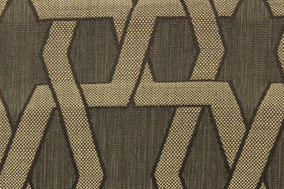 This jacquard fabric features a contemporary pattern with interlocking shapes in taupe against a brown background.  It can be used for multi purpose upholstery, bedding, accent pillows and drapery.  