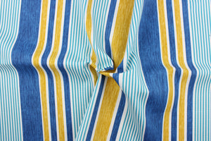This outdoor fabric features a stripe design in blue, white, golden tan, and aqua. 