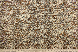 This fabric features a chic cheetah design in black, and brown. 