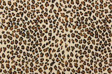 Load image into Gallery viewer, This fabric features a chic cheetah design in black, and brown. 
