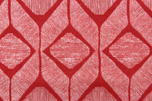 Load image into Gallery viewer, This outdoor fabric features a geometric design in white against a true red.

