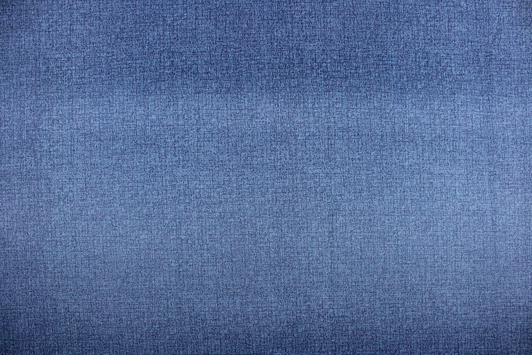 An outdoor fabric in a beautiful solid blue with hints of a dark blue. 