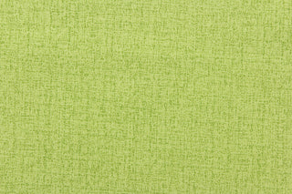 An outdoor fabric in a beautiful solid green with hints of a dark green.