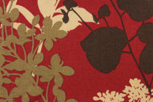Load image into Gallery viewer, This fabric features a bold floral design in beige, taupe, and brown against a dark red background.
