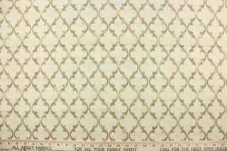 This fabric features a geometric design in beige and off white .