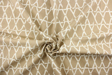 Load image into Gallery viewer, This fabric features a geometric design in white and beige.
