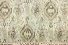 Load image into Gallery viewer, This fabric features a Aztec or tribal  like design in beige, gray, golden tan, and off white.
