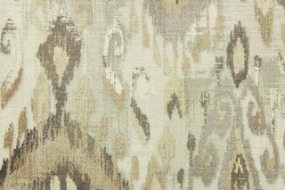 This fabric features a Aztec or tribal  like design in beige, gray, golden tan, and off white.