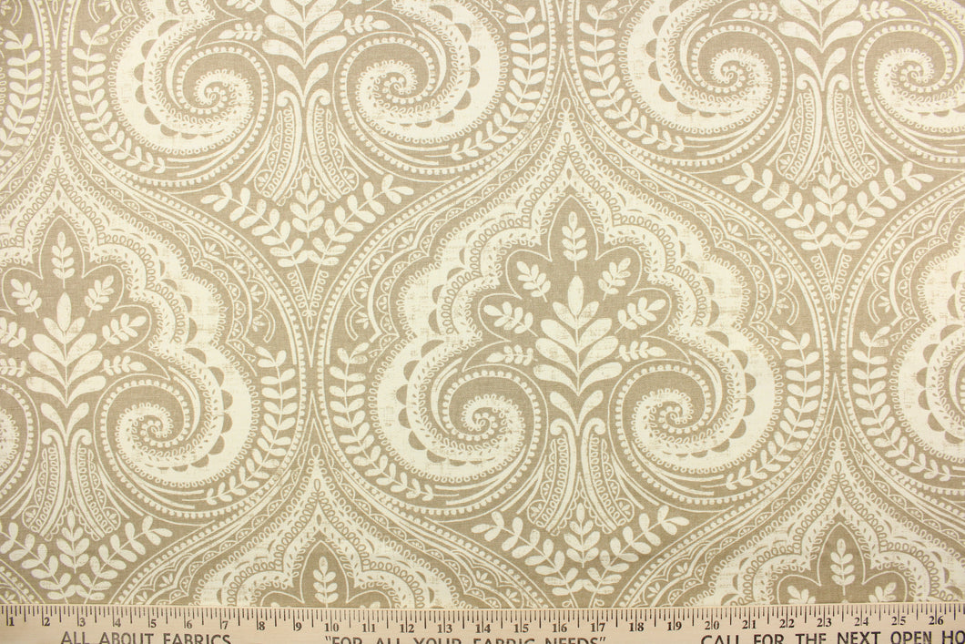 This gorgeous fabric features a demask design in dull white and beige. 