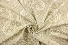 Load image into Gallery viewer, This gorgeous fabric features a demask design in dull white and beige. 
