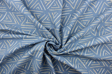 Load image into Gallery viewer, This fabric features a geometric design of triangles in gray and white against a light blue .
