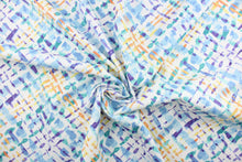 Load image into Gallery viewer, This outdoor fabric features a diagonal plaid design in purple, blue , yellow, orange, and turquoise against a white background.
