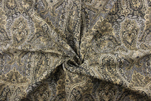 Load image into Gallery viewer, This fabric features a Persian rug design in tan, taupe, beige, gray, dark gray, and black.
