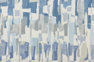 This fabric features an abstract design in shades of blue, gray and white.