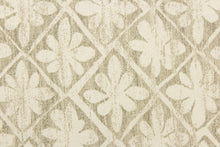 Load image into Gallery viewer, This fabric features a flower tile design in dull white and gray. 
