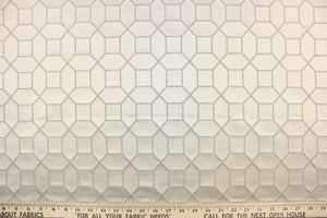 This elegant woven jacquard features a geometric design in dark sand against a satin sand background.  It is clean and crisp and would work well for draperies, curtains, cornice boards, pillows, cushions, bedding, headboards and furniture upholstery.  It has a rating of 9,000 double rubs.