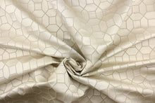 Load image into Gallery viewer, This elegant woven jacquard features a geometric design in dark sand against a satin sand background.  It is clean and crisp and would work well for draperies, curtains, cornice boards, pillows, cushions, bedding, headboards and furniture upholstery.  It has a rating of 9,000 double rubs.
