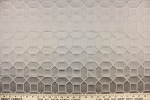 Load image into Gallery viewer, This elegant woven jacquard features a geometric design in silver gray against a satin pewter background.  It is clean and crisp and would work well for draperies, curtains, cornice boards, pillows, cushions, bedding, headboards and furniture upholstery.  It has a rating of 9,000 double rubs.
