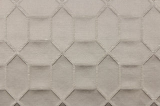 This elegant woven jacquard features a geometric design in silver gray against a satin pewter background.  It is clean and crisp and would work well for draperies, curtains, cornice boards, pillows, cushions, bedding, headboards and furniture upholstery.  It has a rating of 9,000 double rubs.