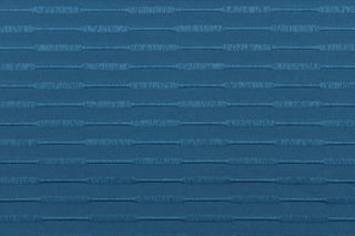 This duotone striped jacquard fabric in marine blue is durable and hard wearing with a rating of 30,000 double rubs.  It can be used for multi purpose upholstery, bedding, accent pillows and drapery.  