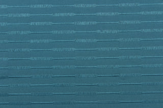 This duotone striped jacquard fabric in lagoon blue is durable and hard wearing with a rating of 30,000 double rubs.  It can be used for multi purpose upholstery, bedding, accent pillows and drapery.  