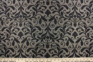 This jacquard fabric features a contemporary pattern with a leaf design in ebony on a background of beige and light brown tones. The fabric has a slight sheen which enhances the design.  It can be used for multi-purpose upholstery, bedding, accent pillows, home decor and drapery.  We offer this fabric in