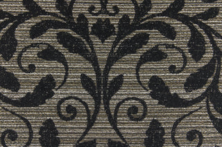 This jacquard fabric features a contemporary pattern with a leaf design in ebony on a background of beige and light brown tones. The fabric has a slight sheen which enhances the design.  It can be used for multi-purpose upholstery, bedding, accent pillows, home decor and drapery.  We offer this fabric in