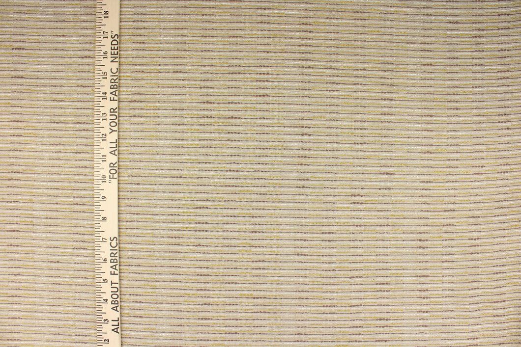 This heavy striped fabric in the colors of brown, gold and white on a tan colored background is perfect for accent pillows, window treatments (draperies, valances), and upholstery projects. 