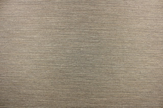 This multi-purpose mock linen features a striae pattern in peppercorn with beige undertones.  This classic raw silk look is suitable for draperies, curtains, cornice boards and headboards.  We offer this fabric in other colors.