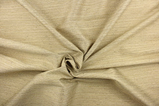 This multi-purpose mock linen features a striae pattern in honey with brown undertones.  This classic raw silk look is suitable for draperies, curtains, cornice boards and headboards.  We offer this fabric in other colors.