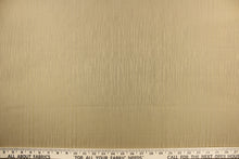 Load image into Gallery viewer, Session is a textured duo tone fabric in golden beige.  It is clean and crisp and would work well for draperies, curtains, cornice boards, pillows, cushions, bedding, headboards and other craft projects.
