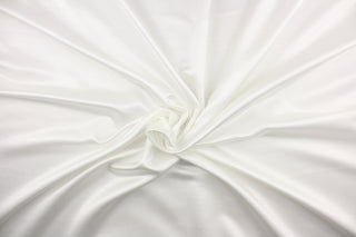 This multi-purpose mock linen in snow white has a soft luxurious feel with a subtle sheen.  It would be great for home decor, window treatments, pillows, duvet covers, tote bags and more.  We offer Shauna in other colors.