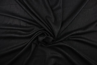 This multi purpose mock linen in black would be great for home decor, window treatments, pillows, duvet covers, tote bags and more.  We offer this fabric in other colors.